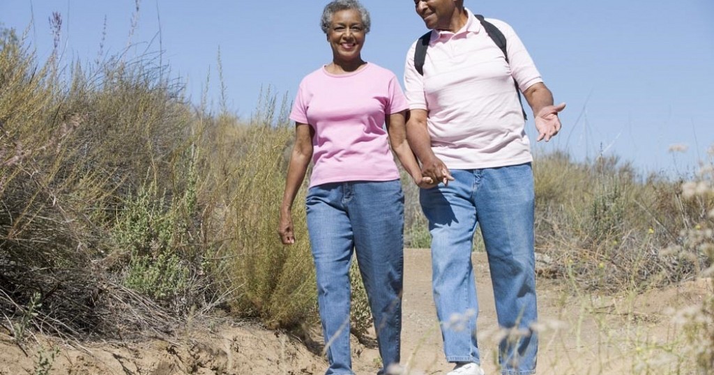 Couple Walking Outside Balancing